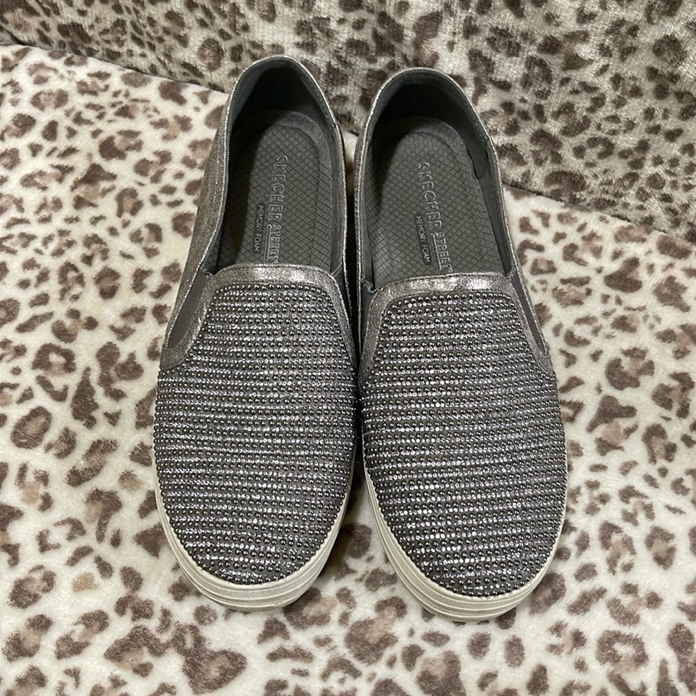 Sketchers slip on shoes. Very comfortable